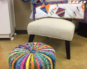 This colorful cushion will brighten your room!
